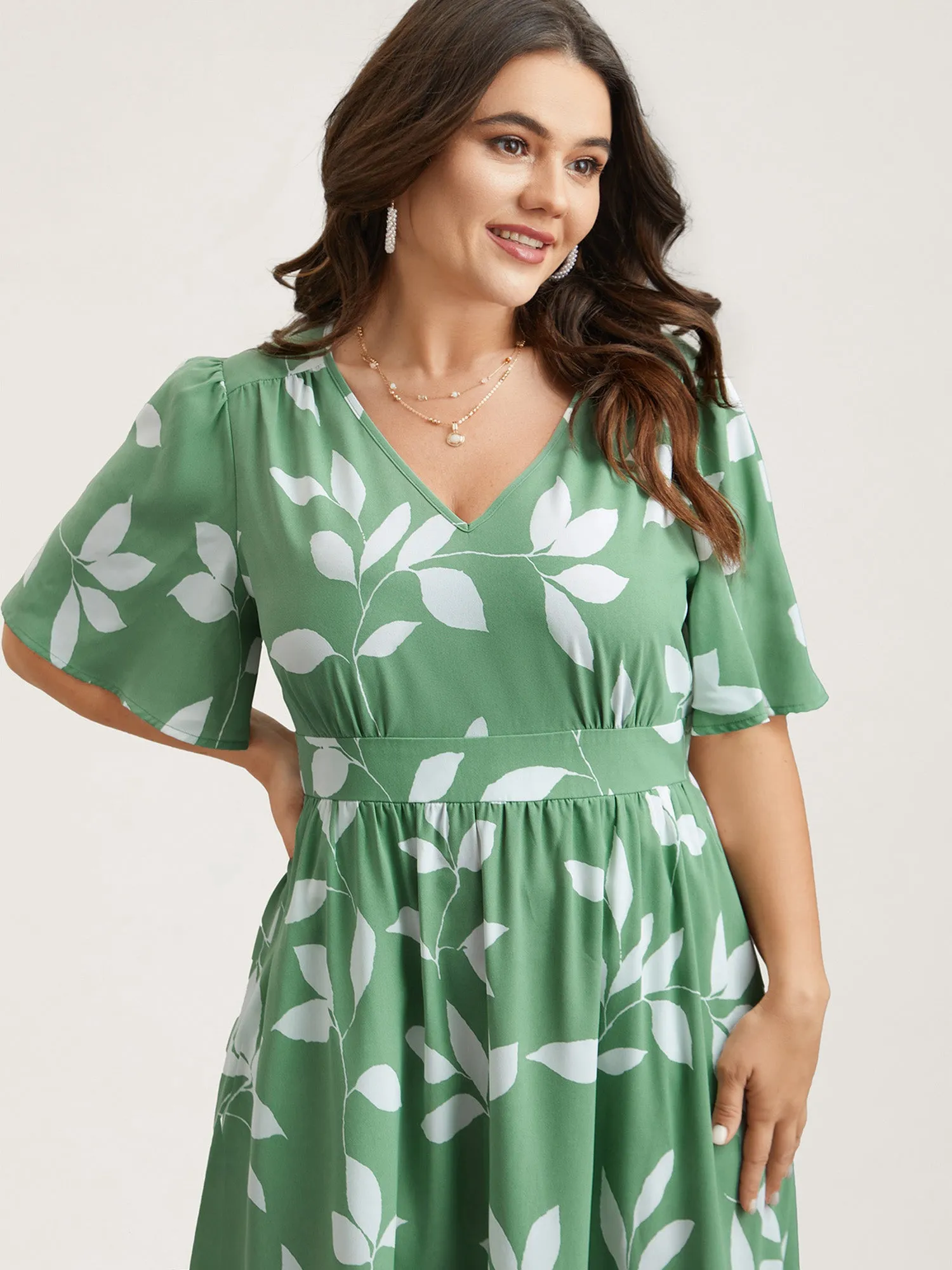 Leaf Print Waist-Cinched Flared Maxi Dress sold by Bloomchic
