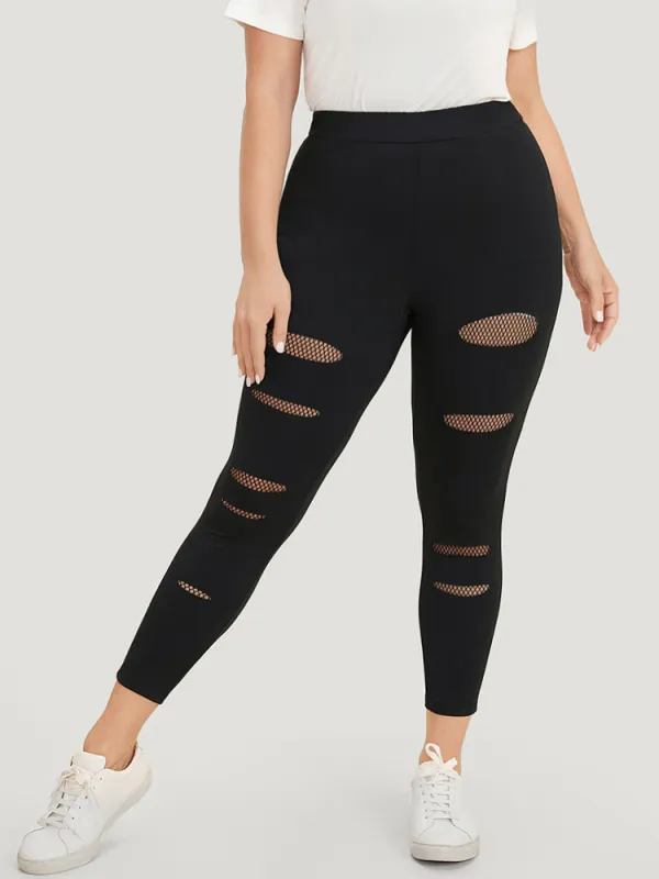 Solid Skinny Fishnet Patchwork Leggings sold by Bloomchic