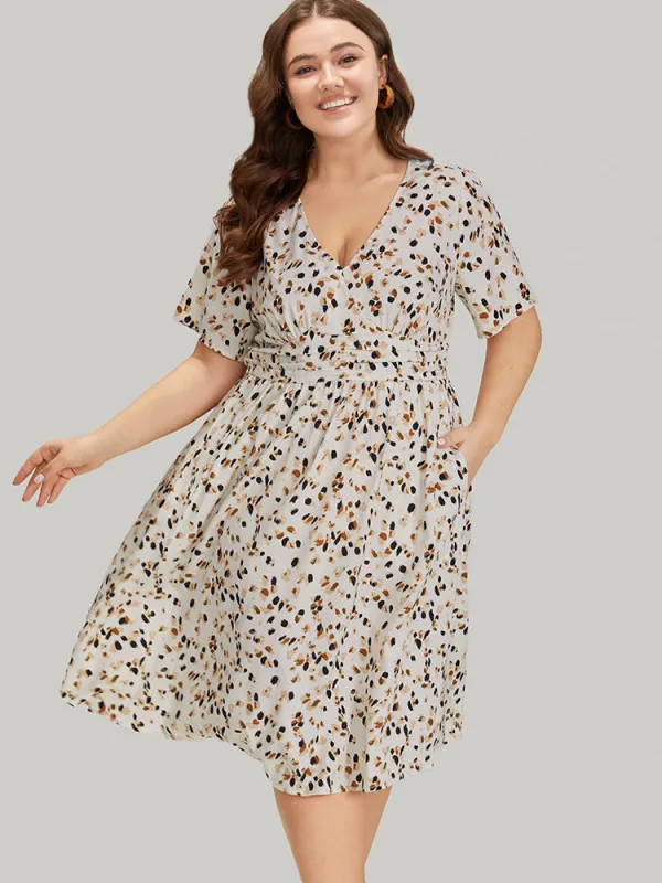 Leopard Print Empire Waist Ruffle Hem Deep V Neck Dress sold by Bloomchic