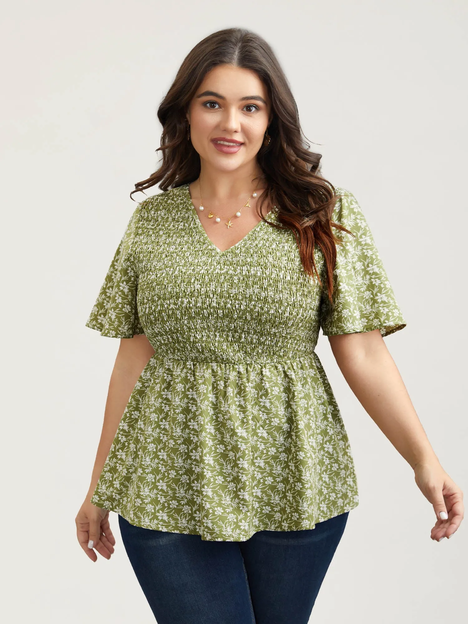 Floral Print Shirred Front Peplum Shirt sold by Bloomchic