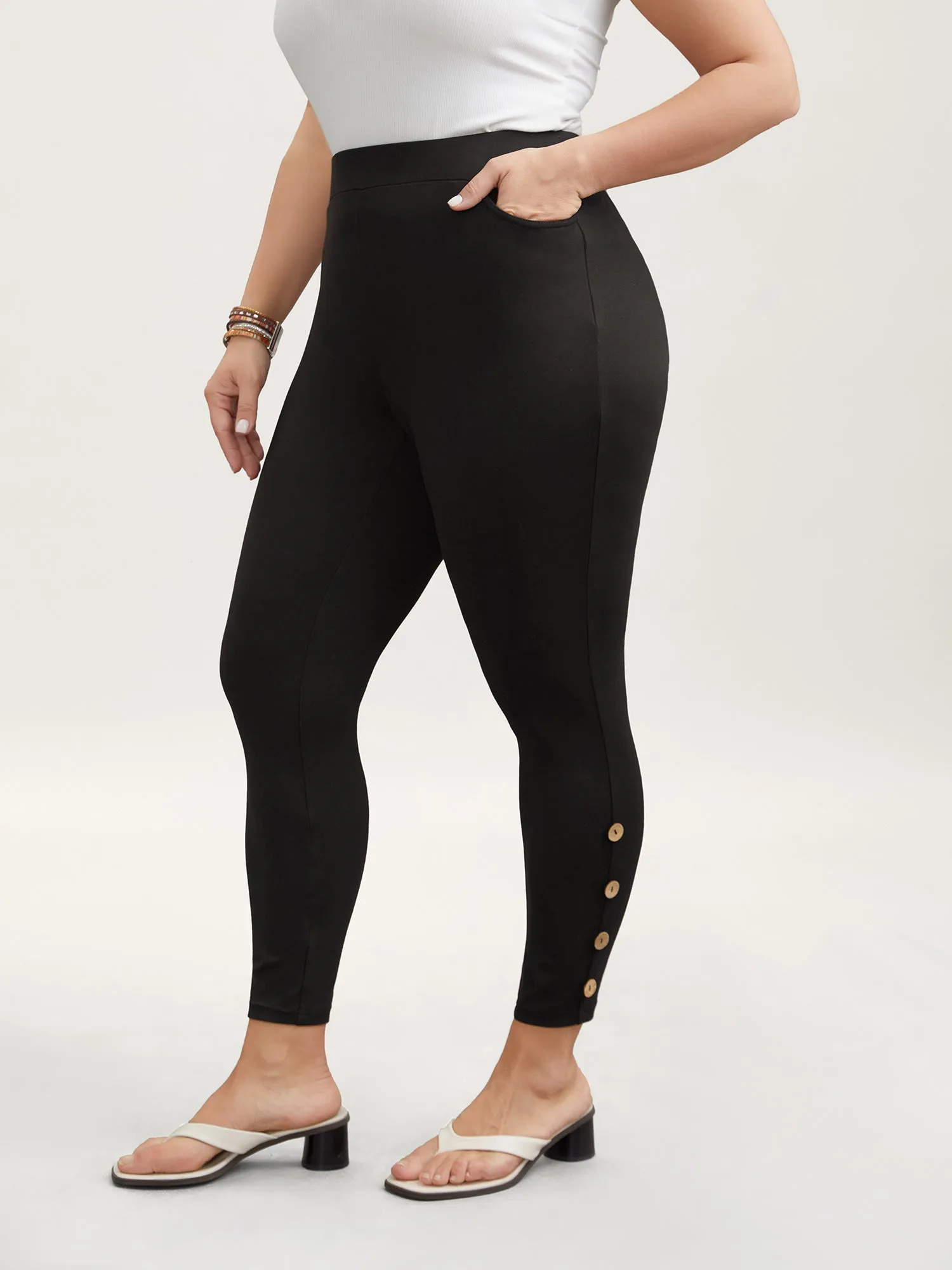 Button Detail Mid-Rise Skinny-Fit Pants sold by Bloomchic