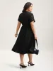 Sheer Back Textured Cut-Out Midi Dress sold by Bloomchic