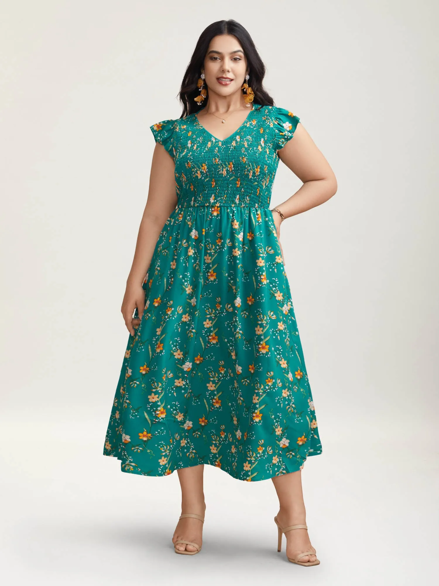 Shirred Printed Flutter Sleeve Pockets Maxi Dress sold by Bloomchic