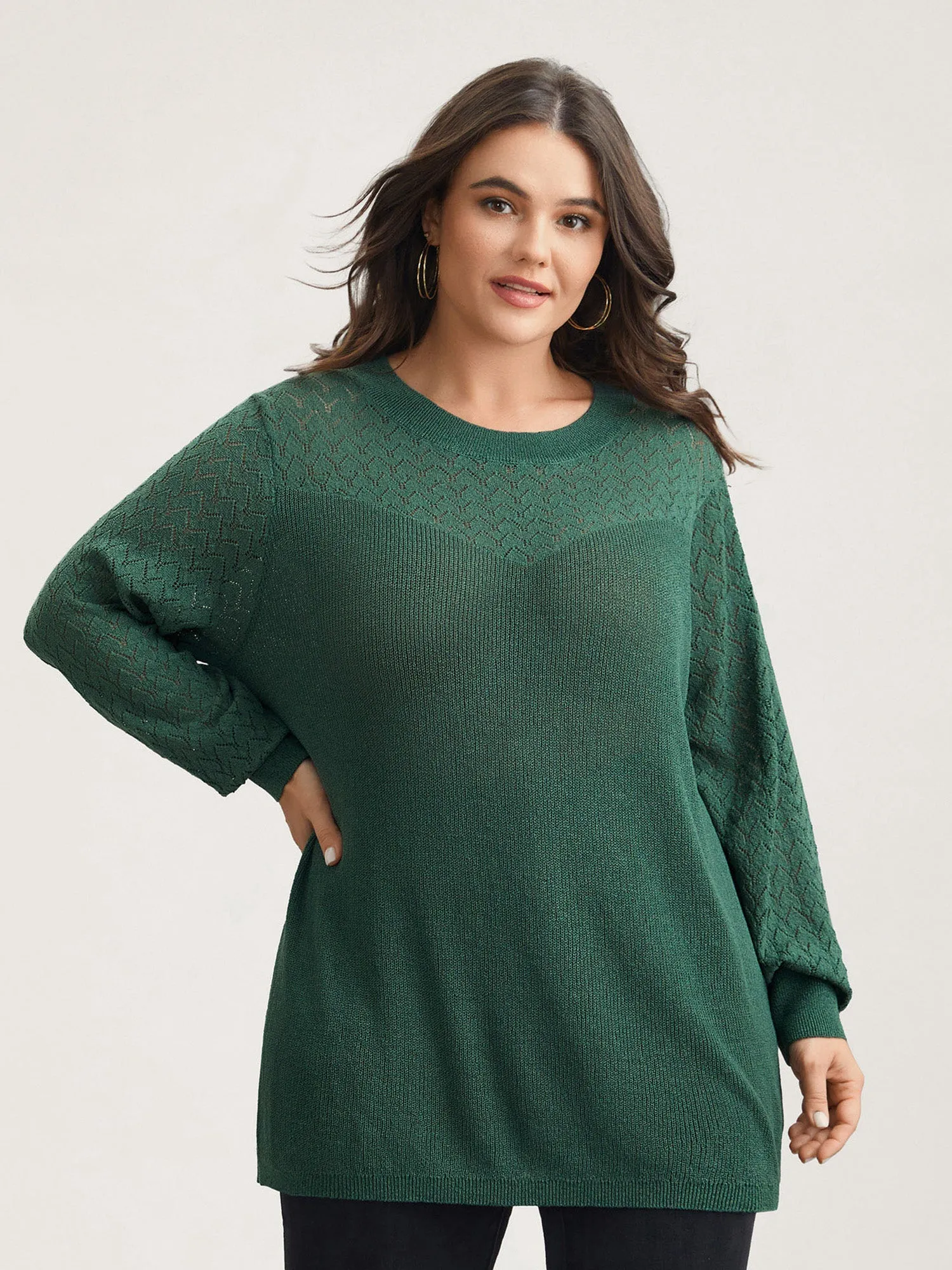 Cut-Out Textured Ribbed Hem Pullover sold by Bloomchic