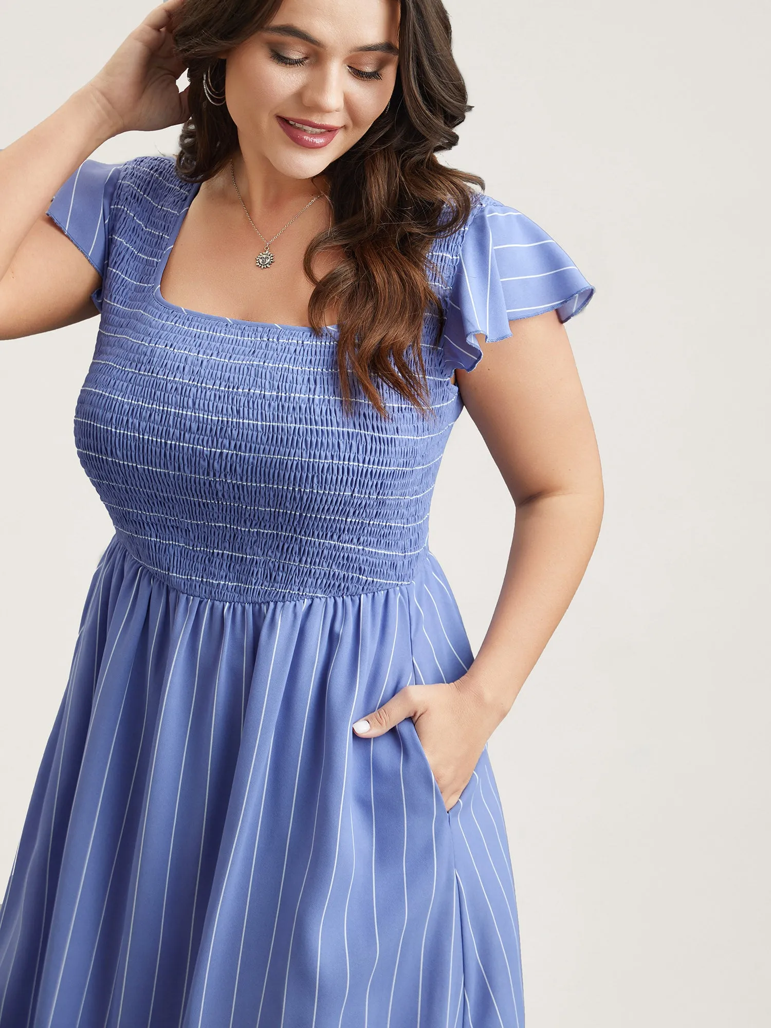 Striped Shirred Flutter Sleeve Midi Dress sold by Bloomchic