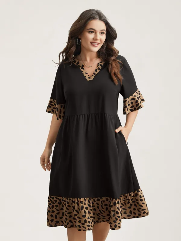 Leopard Print Spliced Tiered Midi Dress sold by Bloomchic
