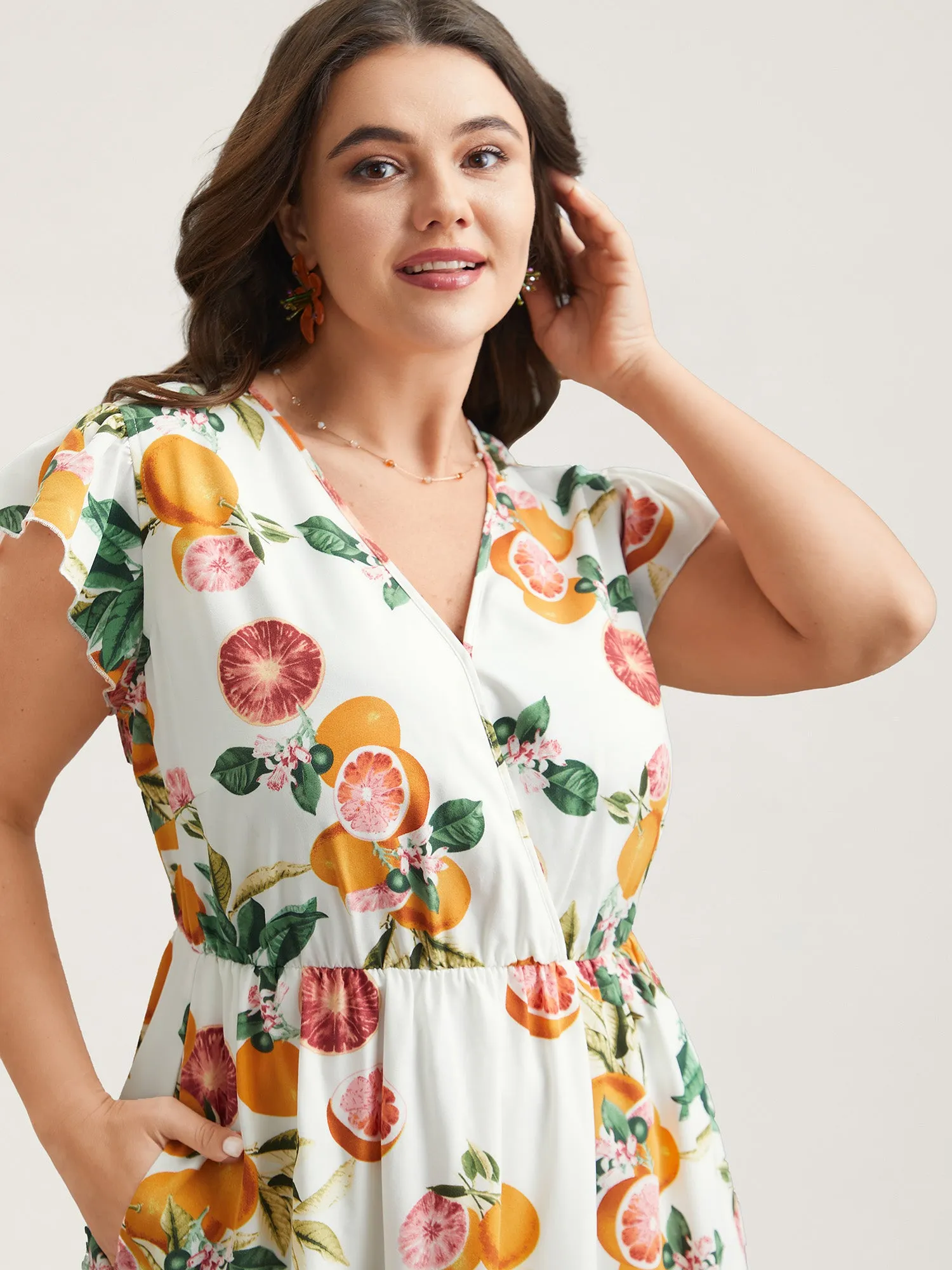 Spring Fruits Wrap Neck Midi Dress sold by Bloomchic