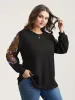 Sheer Floral Sleeve Stretchy Knit Top sold by Bloomchic