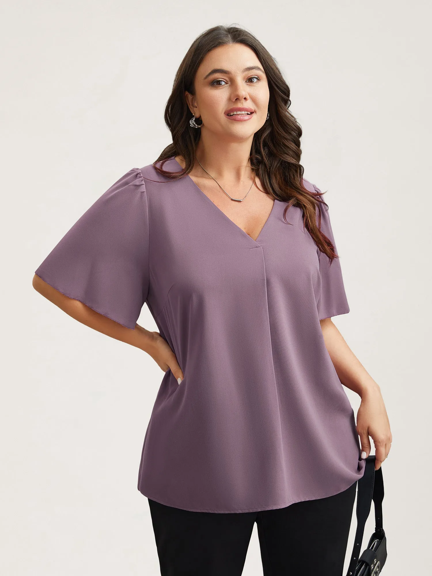 Pleated-Front Flutter Sleeve Shirt sold by Bloomchic
