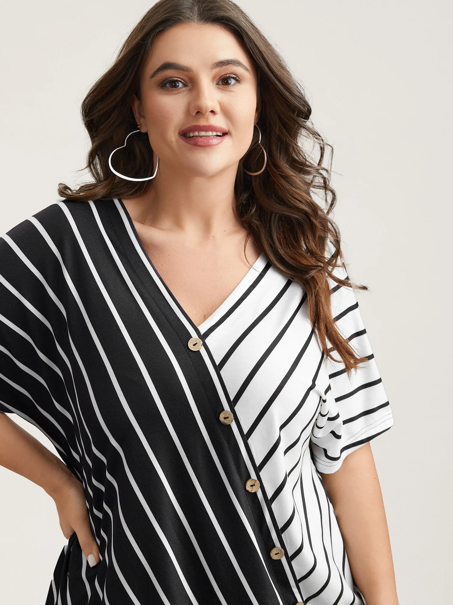 Color Contrast Stripes Button Top sold by Bloomchic