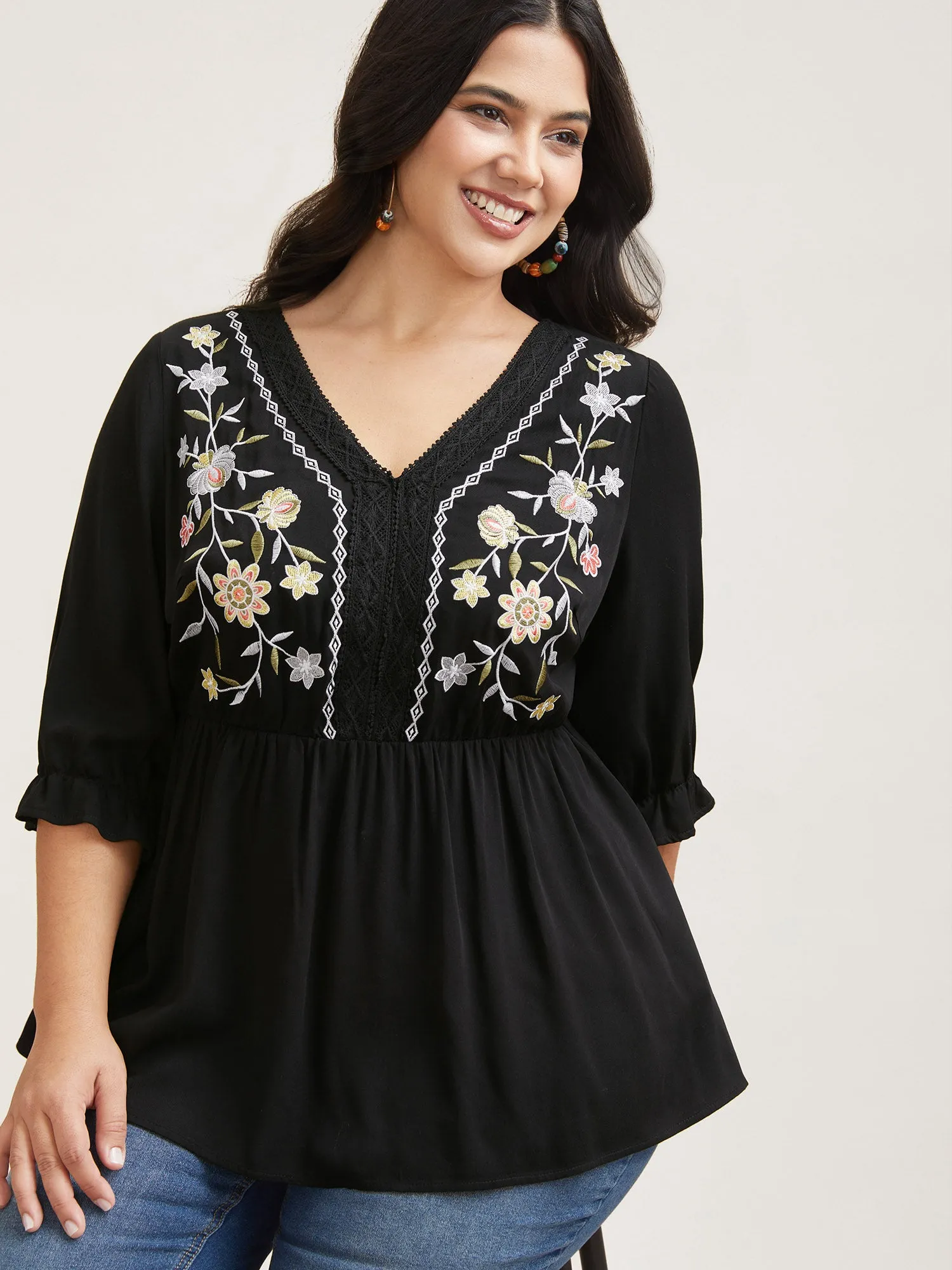Embroidered Lace Spliced Peplum Shirt sold by Bloomchic