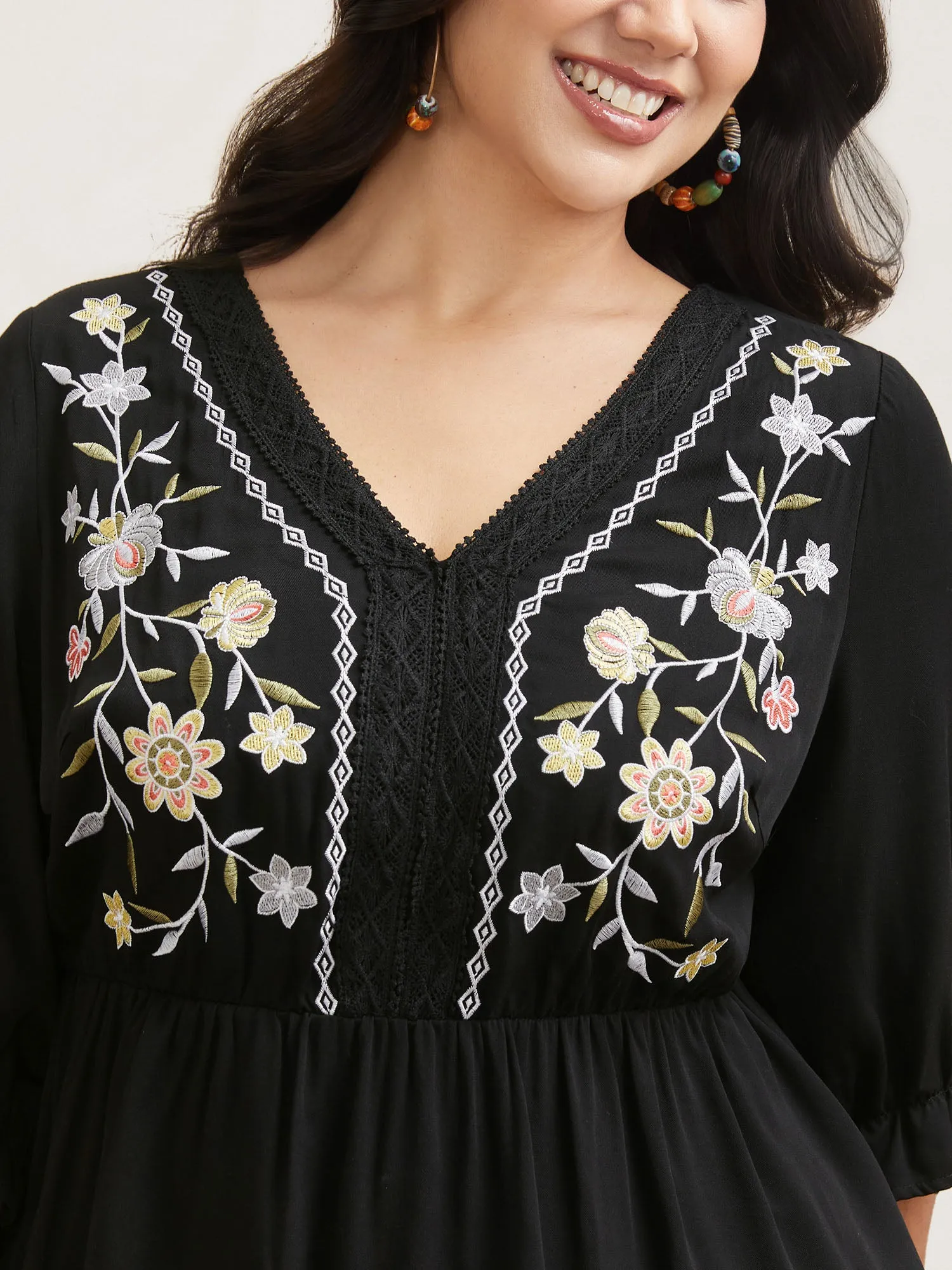 Embroidered Lace Spliced Peplum Shirt sold by Bloomchic product image thumbnail 4