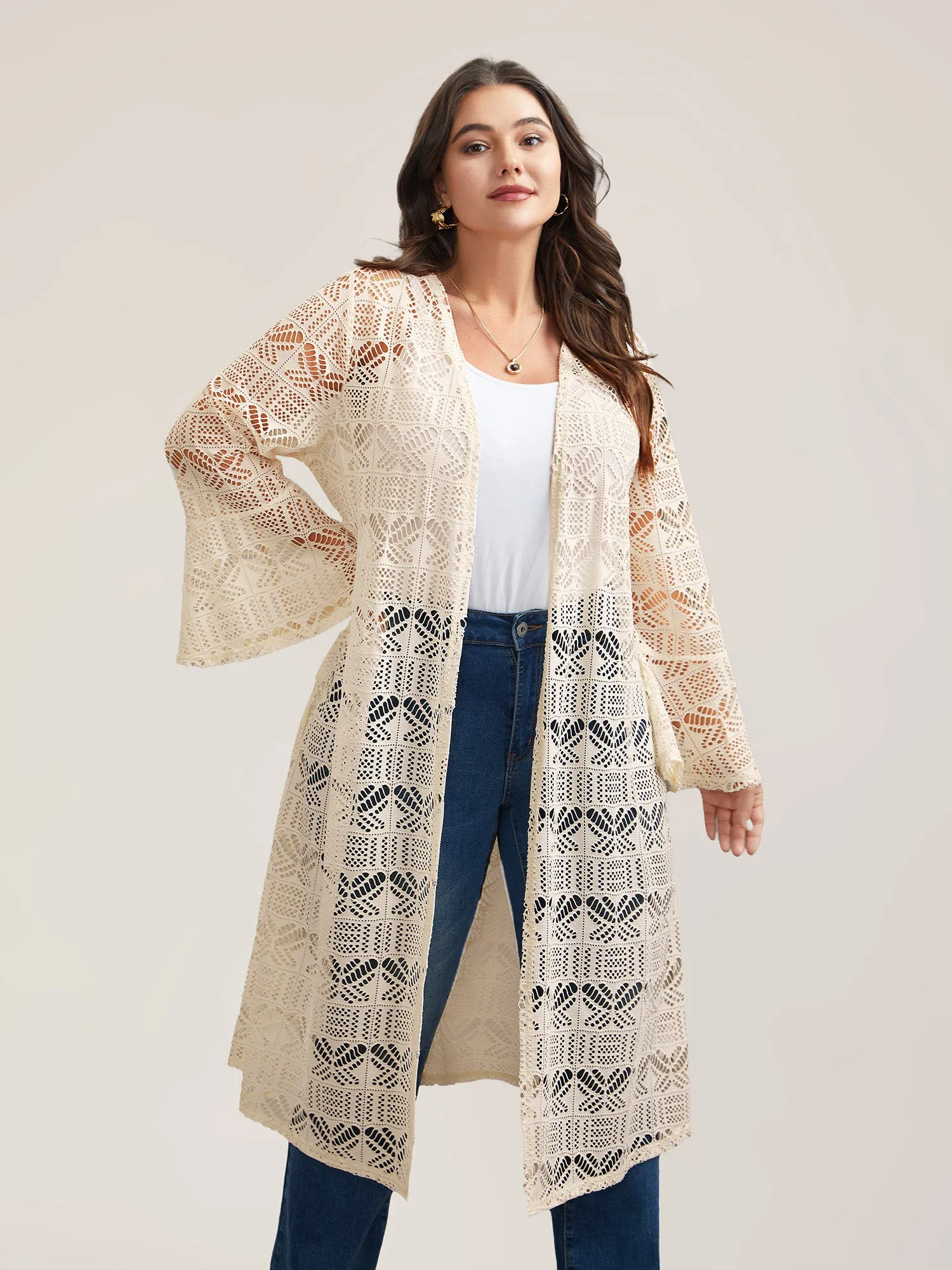 Textured Cut-Out Ruffled Kimono sold by Bloomchic