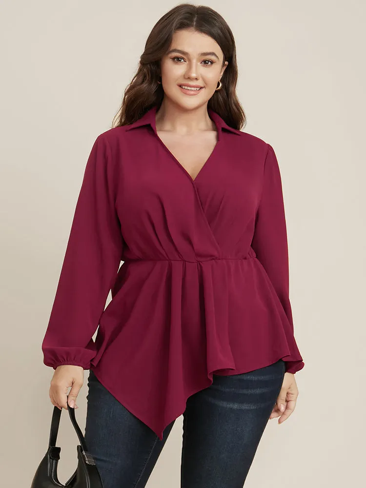 Solid Lantern Sleeve Surplice Neck Asymmetrical Hem Blouse sold by Bloomchic