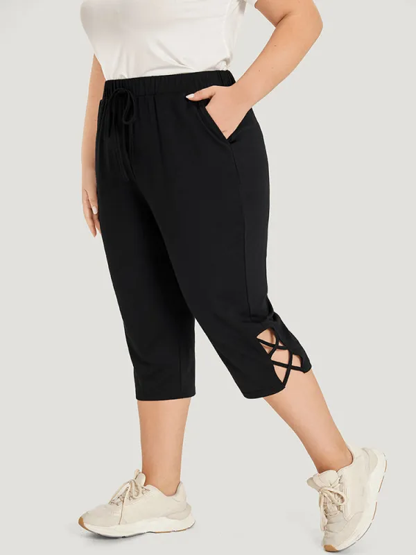 Plain Slant Pocket Crisscross Hem Skinny Sweatpants sold by Bloomchic