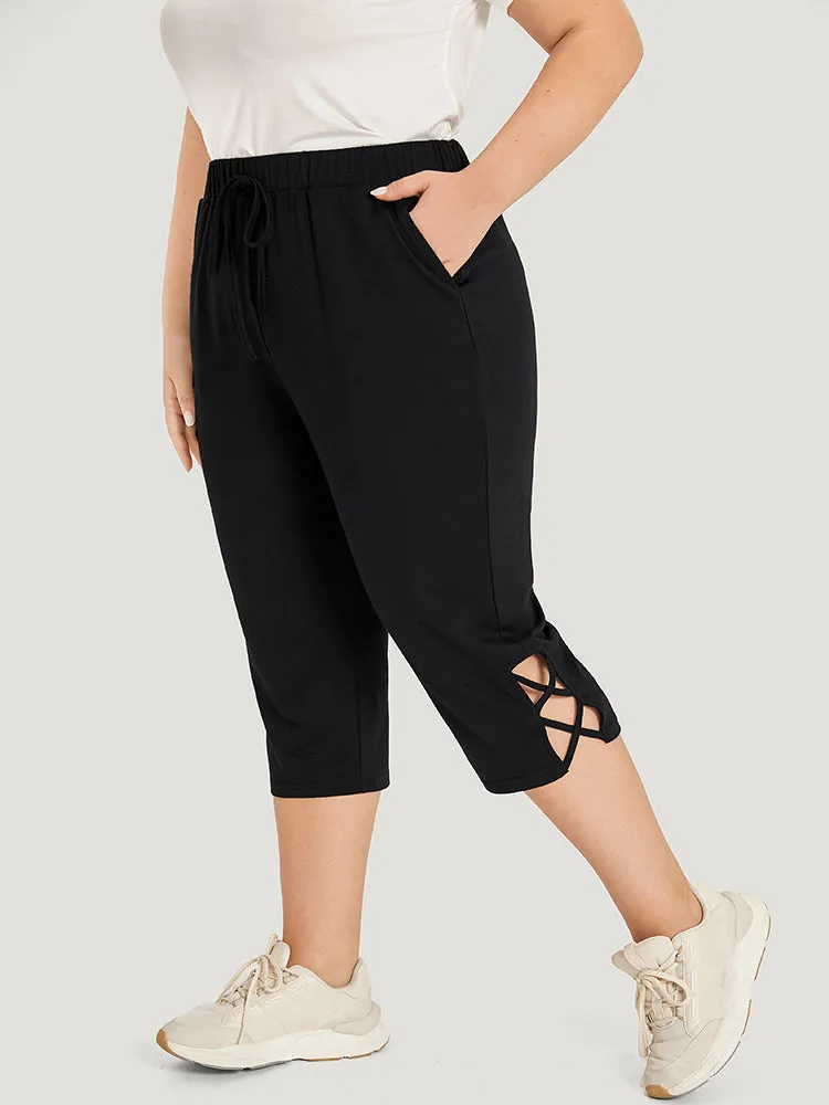 Plain Slant Pocket Crisscross Hem Skinny Sweatpants sold by Bloomchic