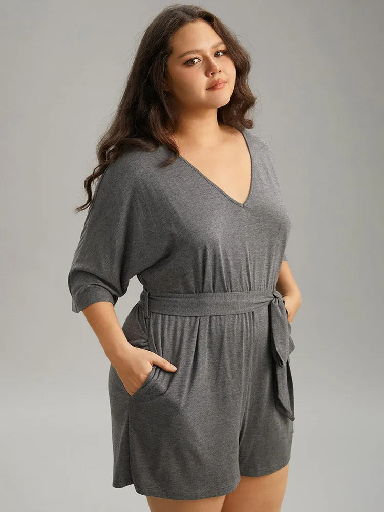 Solid Belted Pocket Sleep Romper sold by Bloomchic