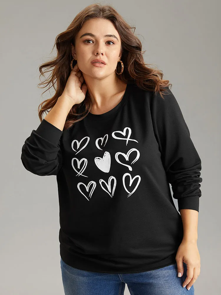 Heart Print Round Neck Sweatshirt sold by Bloomchic