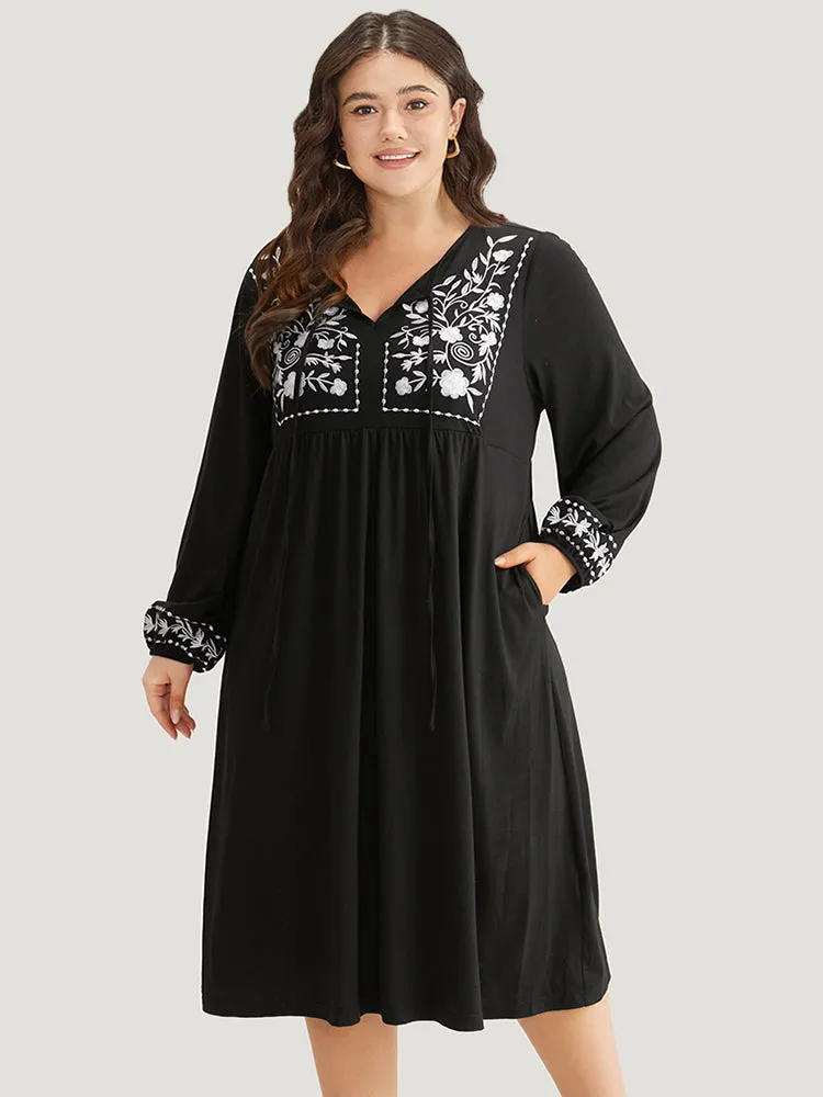 Floral Embroidered Tie Neck Pocket Dress sold by Bloomchic