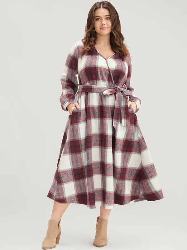 Plaid Surplice Neck Pocket Belted Midi Dress sold by Bloomchic