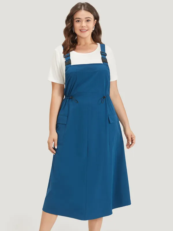 Solid Drawstring Flap Pocket Overall Cami Dress sold by Bloomchic