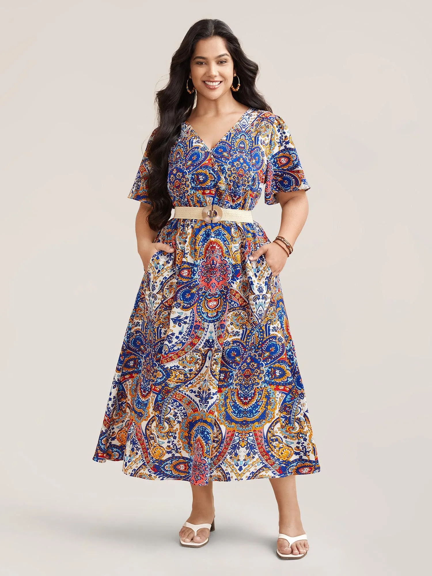 Paisley Print Pockets Surplice Neck Midi Dress sold by Bloomchic