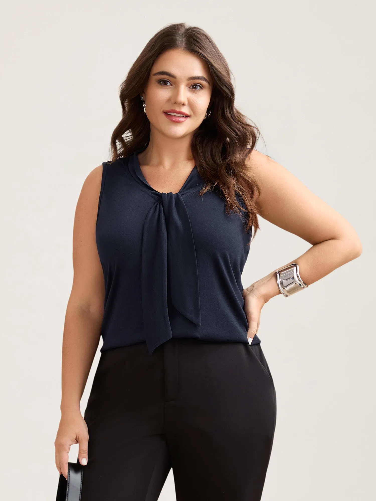 Knotted Neckline Fitted Sleeveless Blouse sold by Bloomchic product image thumbnail 4