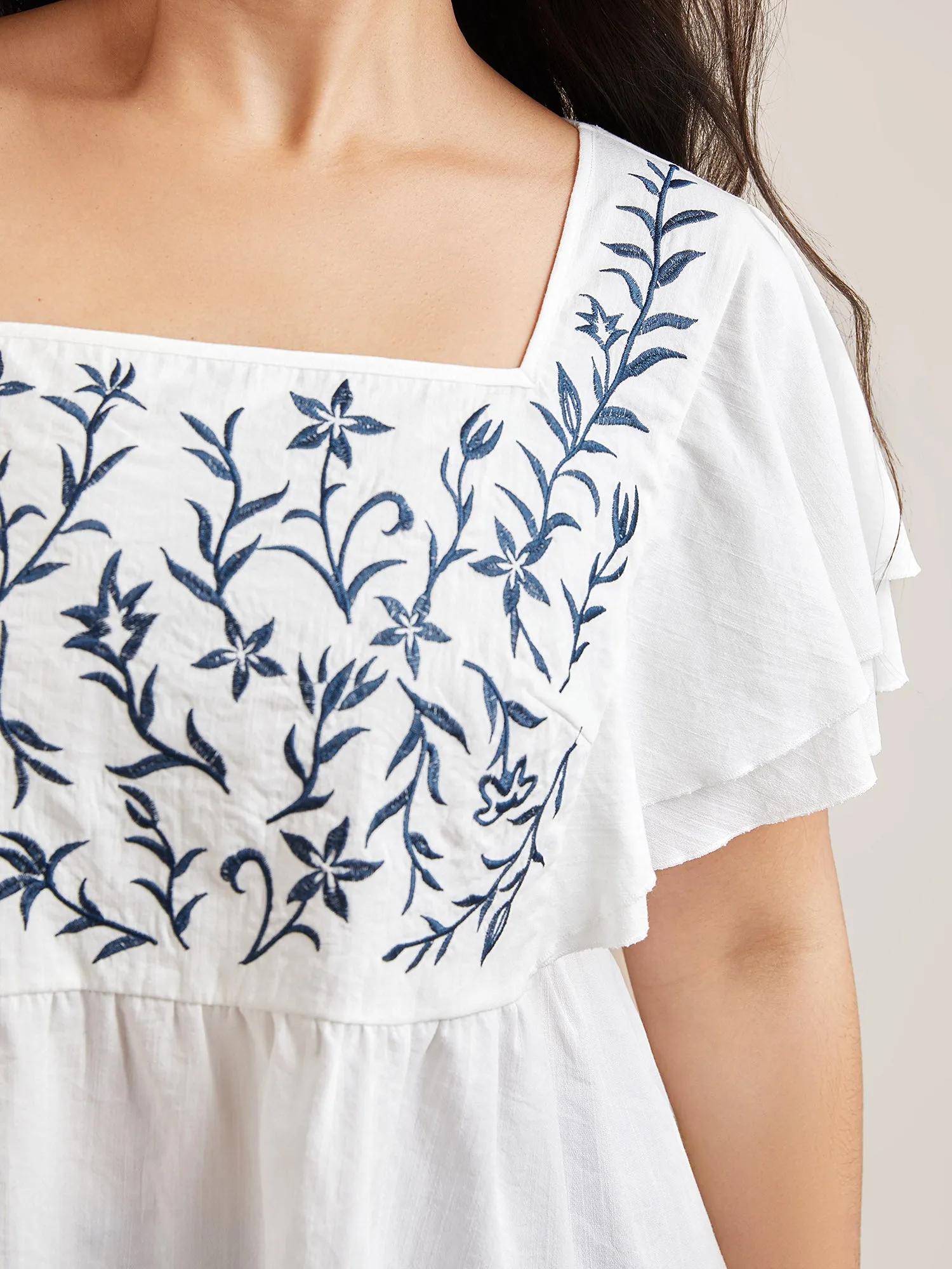 Embroidered Layered Flutter Sleeve Blouse sold by Bloomchic product image thumbnail 3