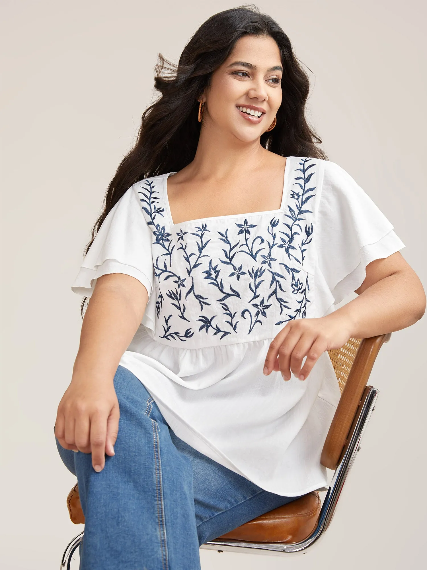 Embroidered Layered Flutter Sleeve Blouse sold by Bloomchic