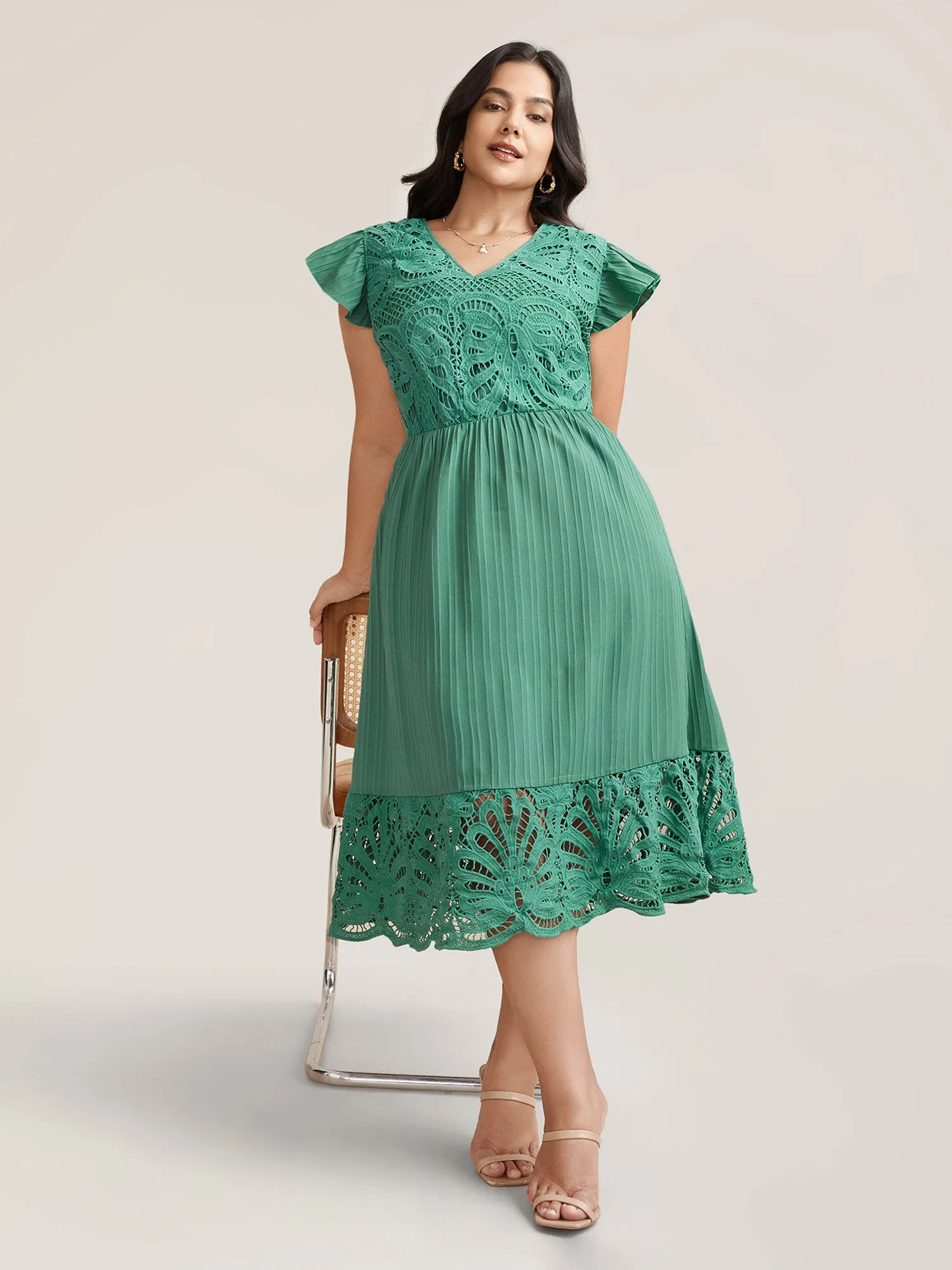 Lace Cut-Out Flutter Sleeve Midi Dress sold by Bloomchic