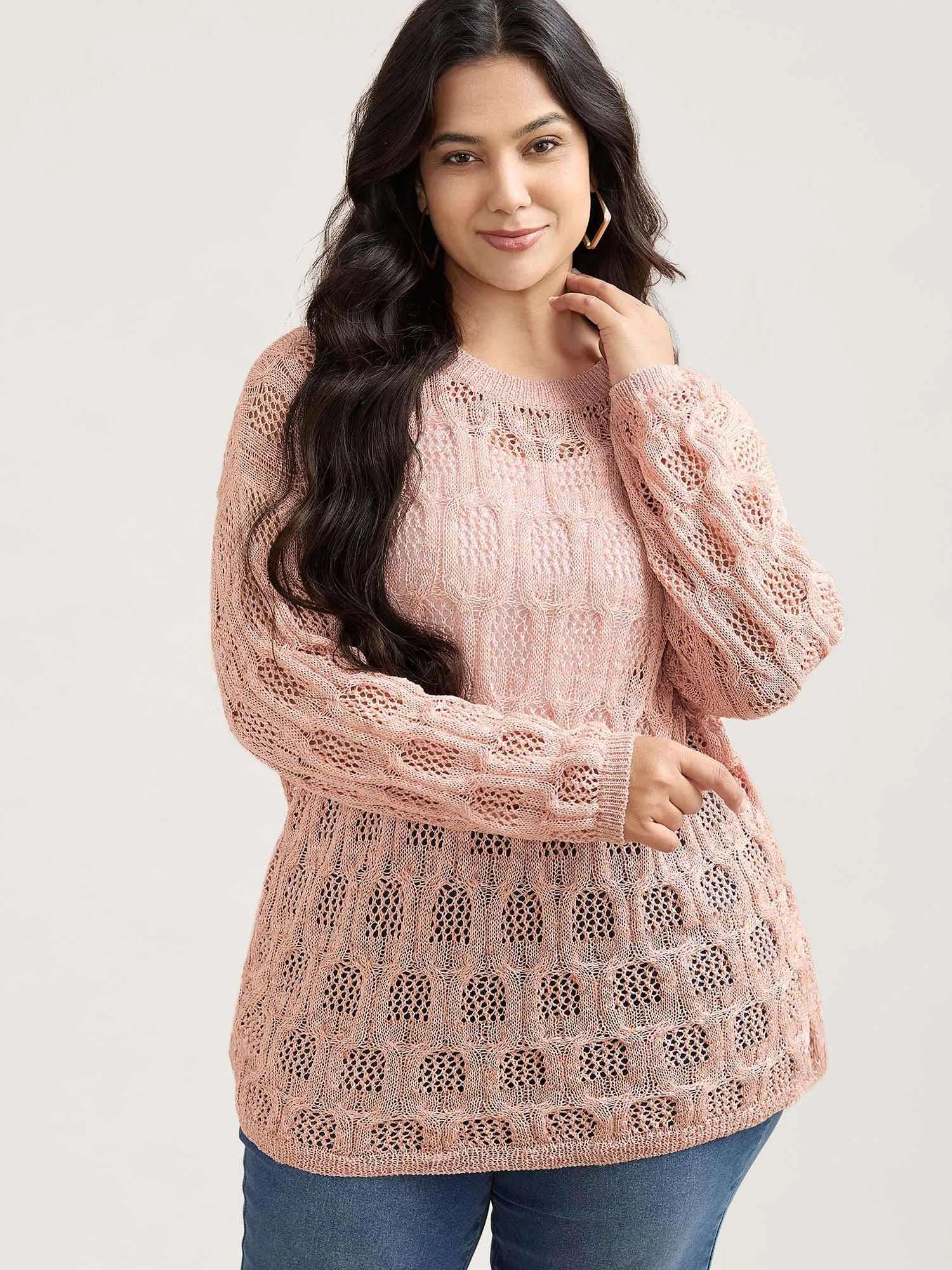 Textured Cut-Out Ribbed Hem Pullover sold by Bloomchic