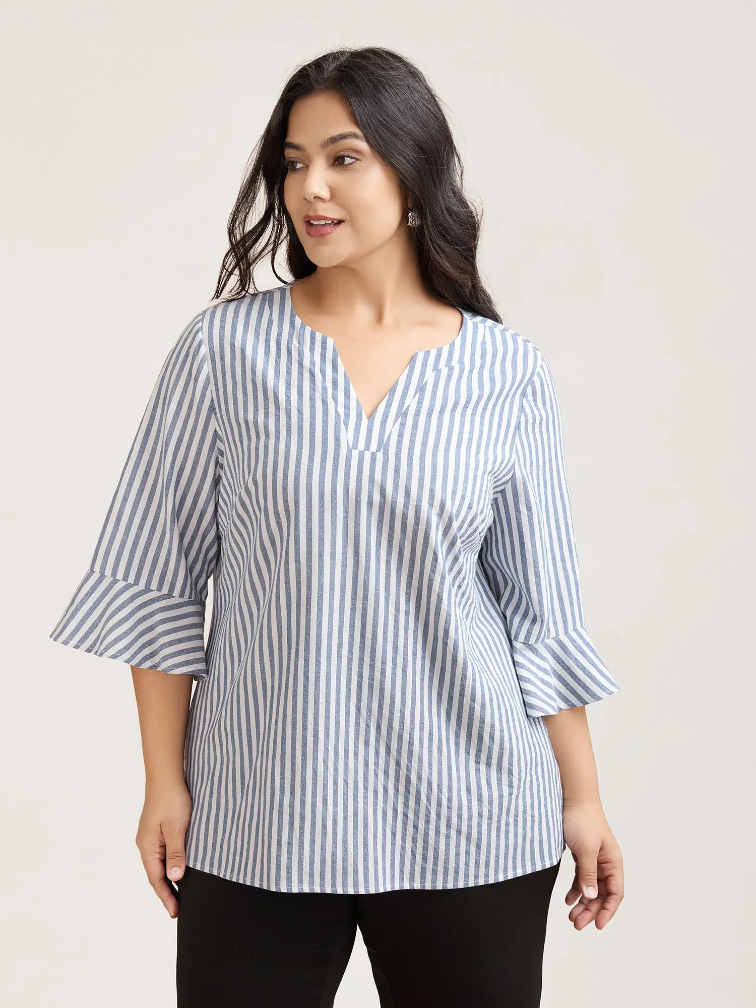 Striped Split Neck Flared Sleeve Shirt sold by Bloomchic