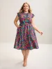 Floral Print Shirred Pockets Midi Dress sold by Bloomchic