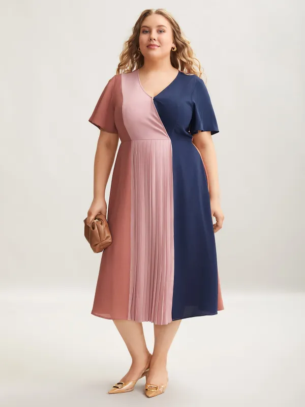 Color Block Pleated Waist-Cinched Midi Dress sold by Bloomchic