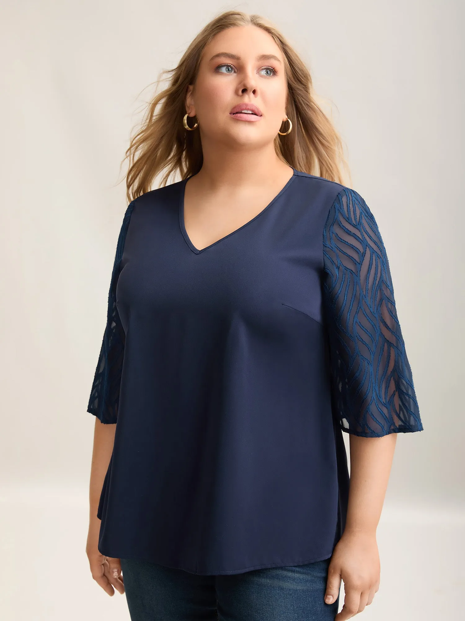 Sheer Mesh Sleeve Spliced V-Neck Blouse sold by Bloomchic