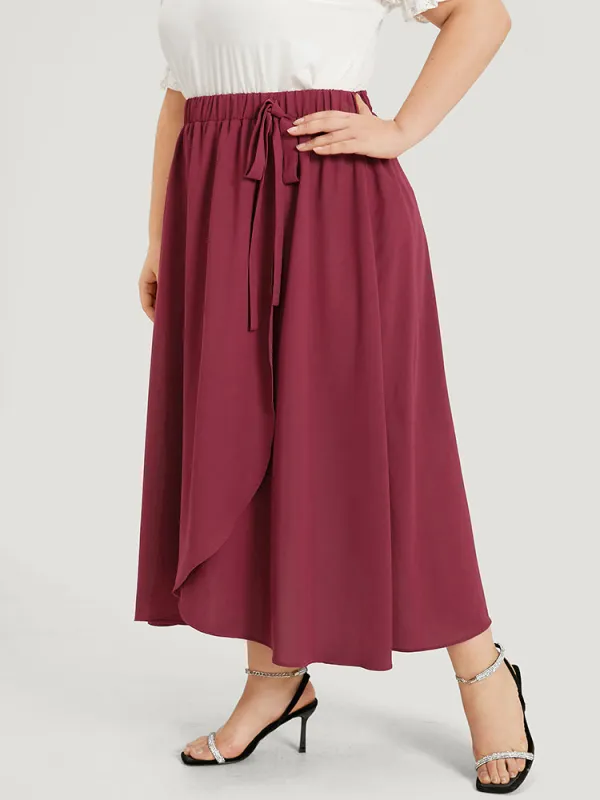Plain Elastic Waist Knot Asymmetrical Hem Skirt sold by Bloomchic