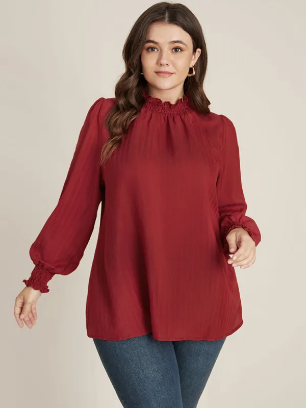 Solid Shirred Mock Neck Textured Blouse sold by Bloomchic