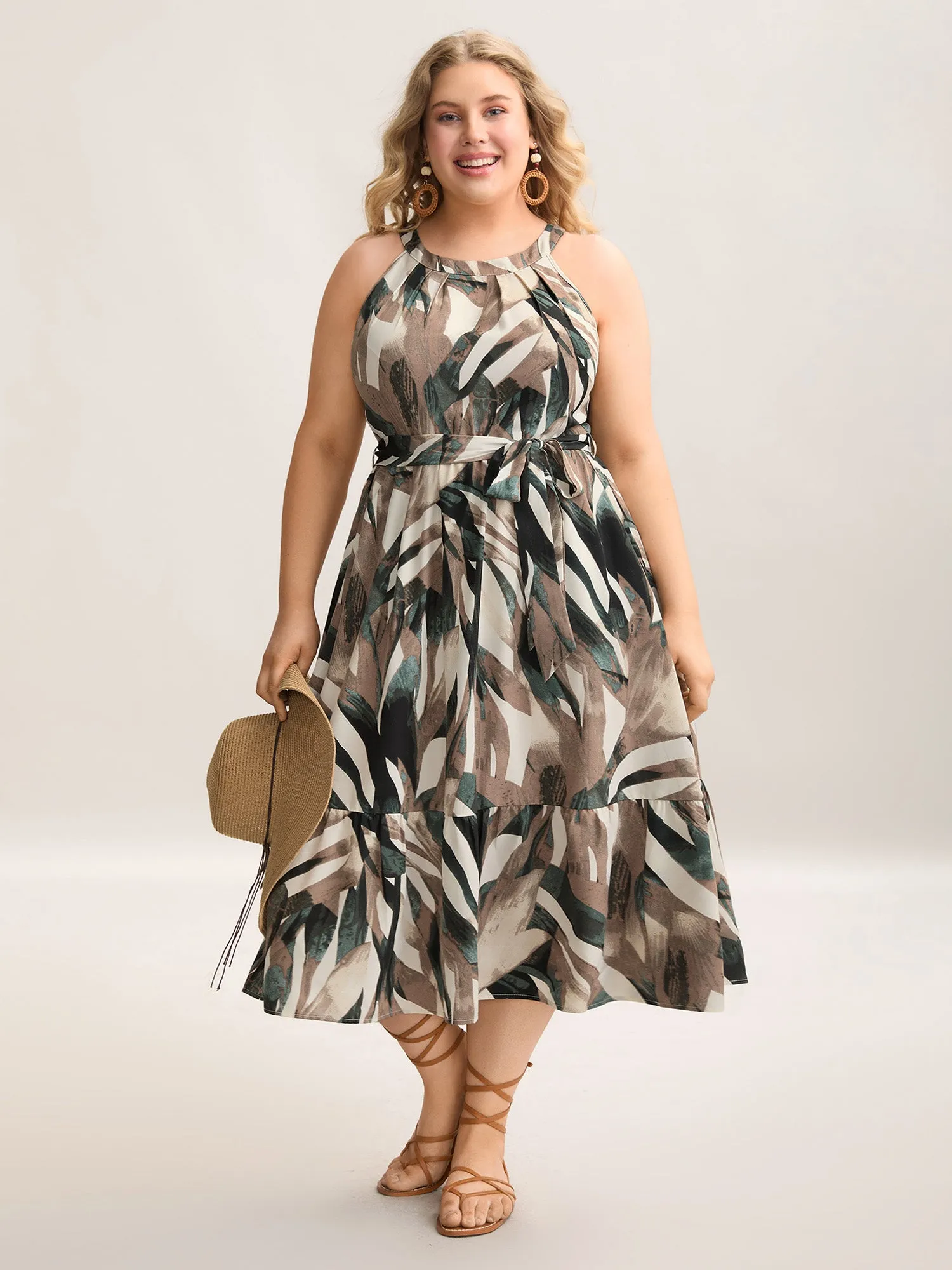 Leaf Print Halter Neck Tiered Midi Dress sold by Bloomchic