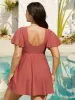 Side Tie Ruffled Tiered Swim Dress sold by Bloomchic