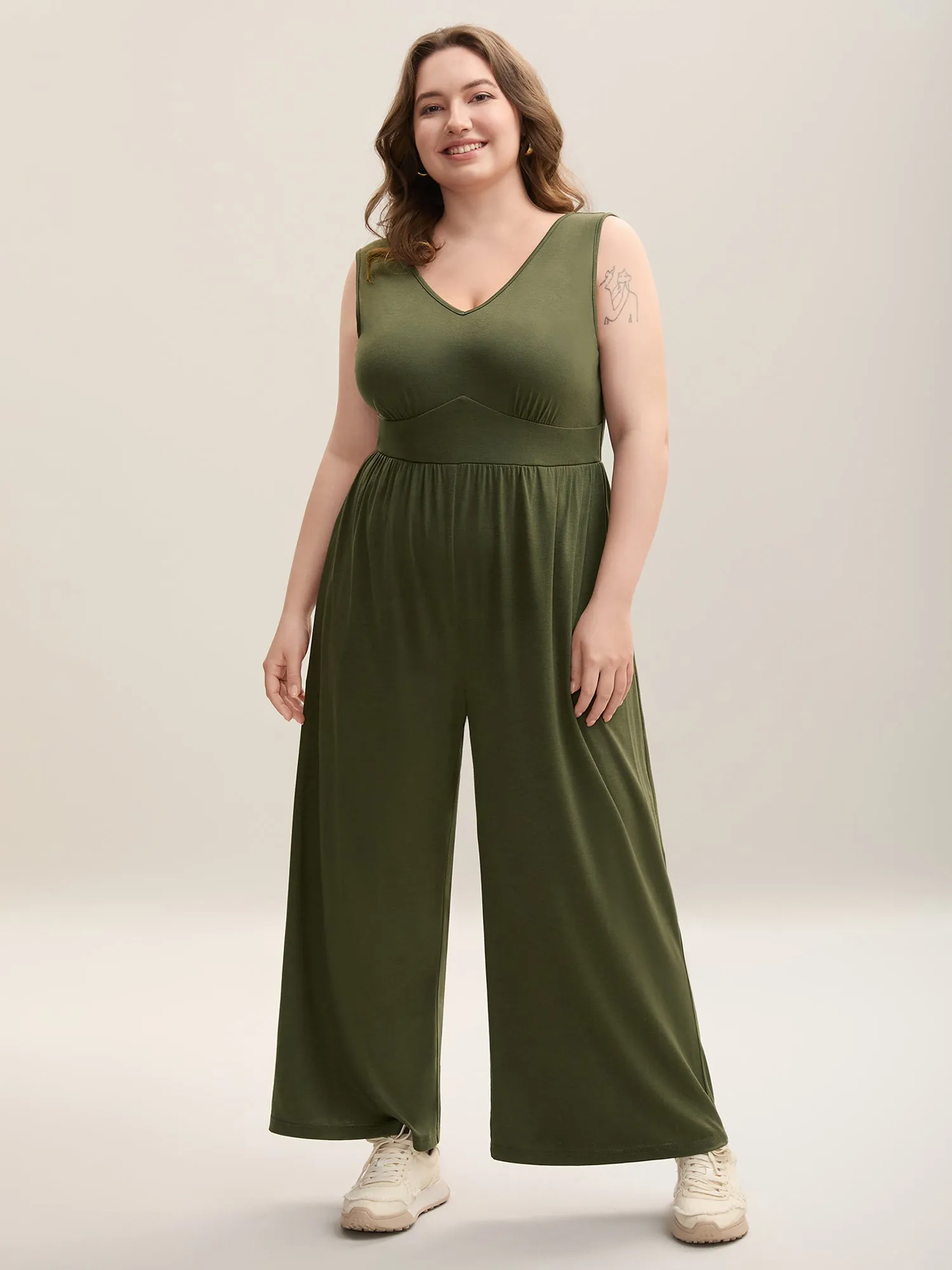 Stretchy Knit Pockets Cross Back Jumpsuit sold by Bloomchic