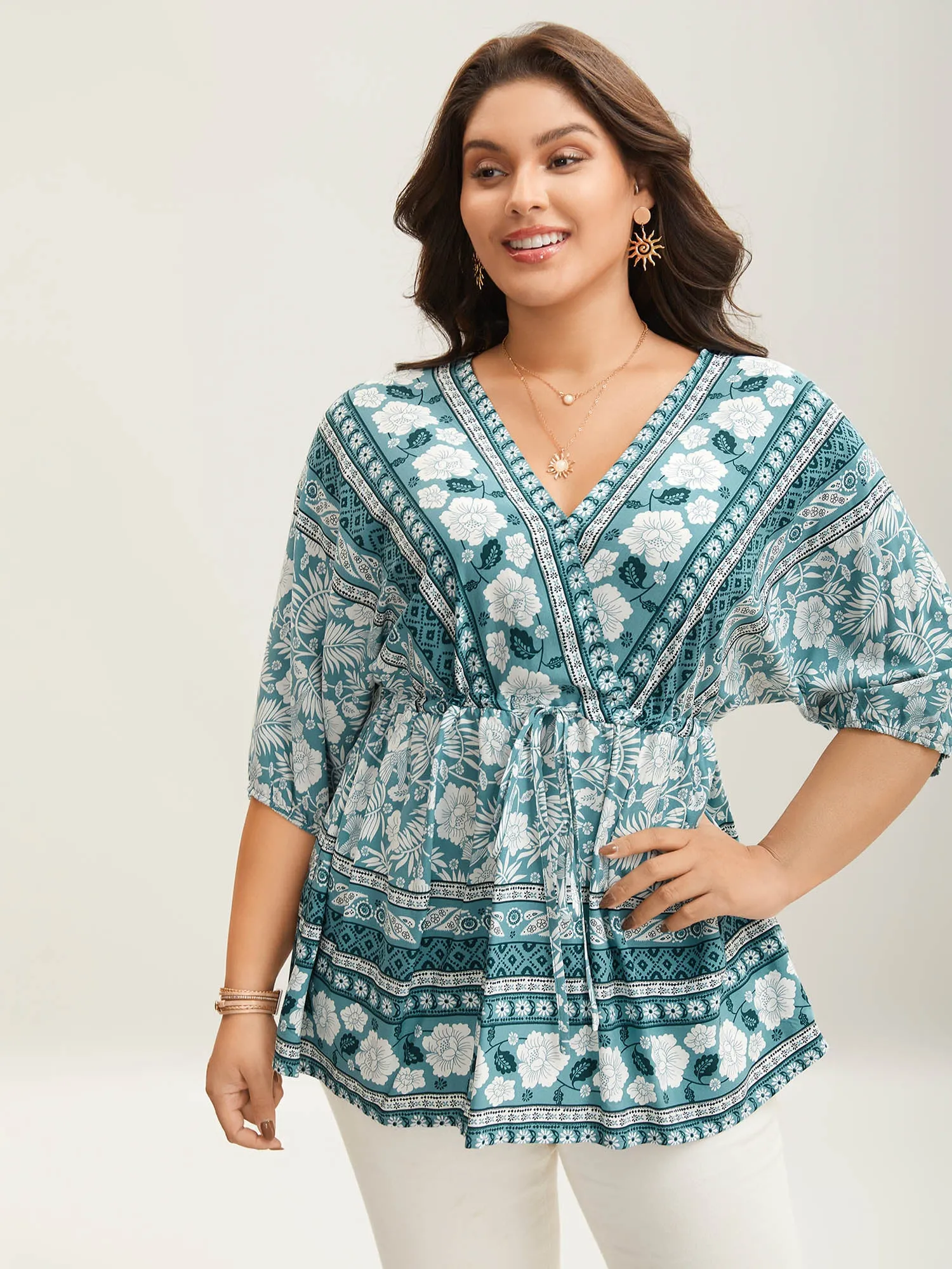 Floral Print Surplice Neck Waist-Cinched Shirt sold by Bloomchic