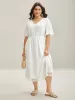Textured Cut-Out Lace Tied Midi Dress sold by Bloomchic