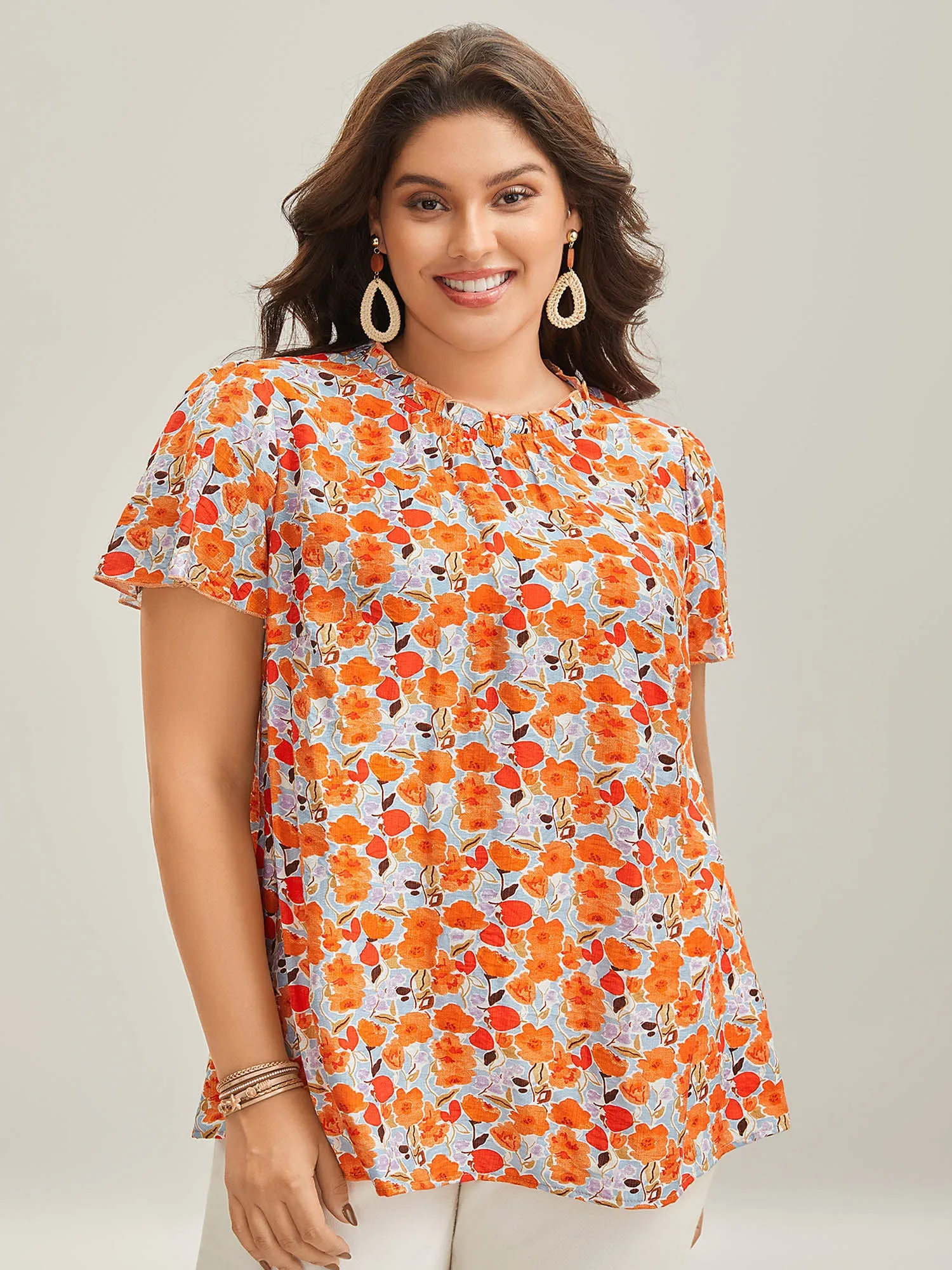 In Full Bloom Mock Neck Shirt sold by Bloomchic