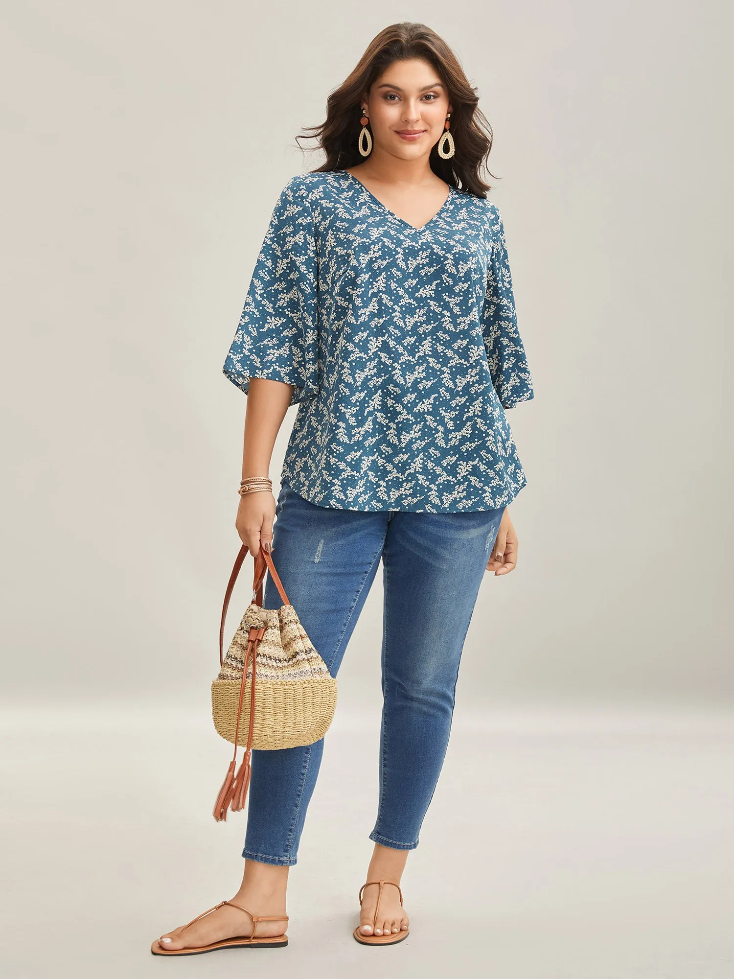 Floral Print Curvy Hem V-Neck Shirt sold by Bloomchic product image thumbnail 3