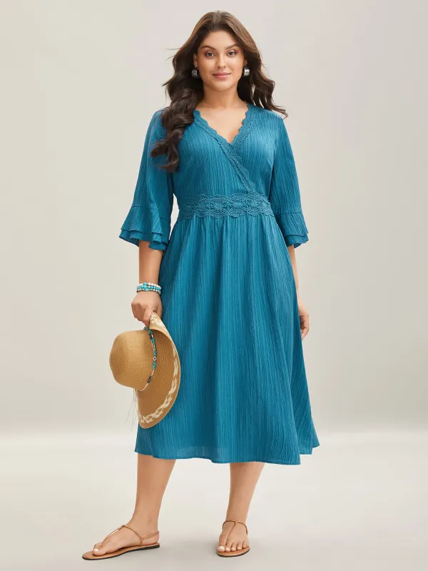 Scalloped Lace Surplice Ruffled Midi Dress sold by Bloomchic