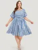 Striped Geo Pocket Belt Pocket Layered Hem Dress sold by Bloomchic