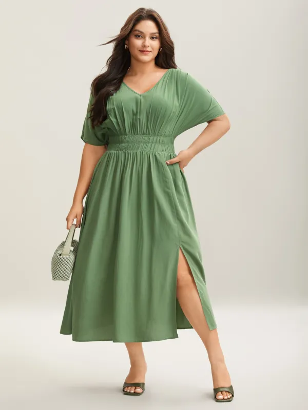 Pleated Solid Color Slit Maxi Dress sold by Bloomchic
