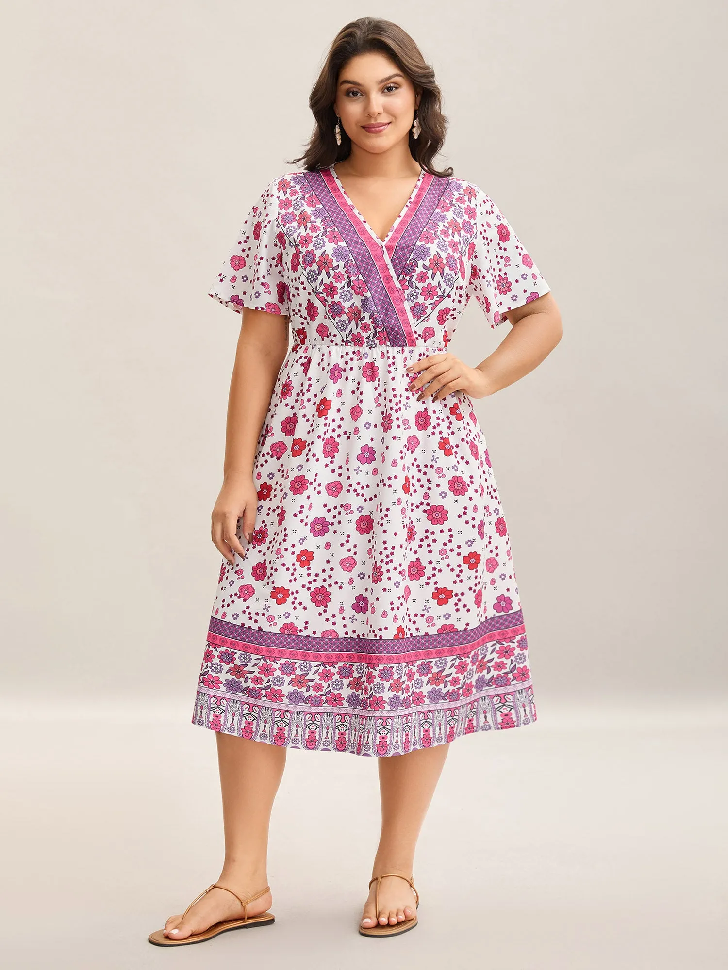 Spring Floral Printed Surplice Neck Midi Dress sold by Bloomchic