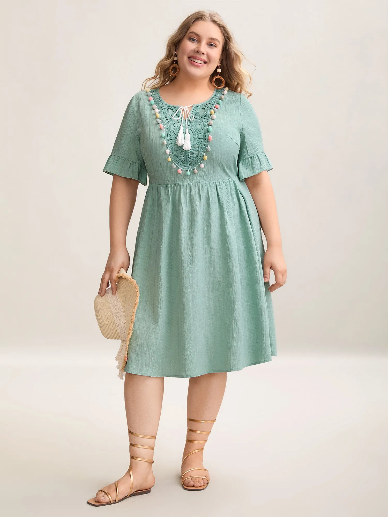 Textured Spliced Multi-Color Tassel Midi Dress sold by Bloomchic