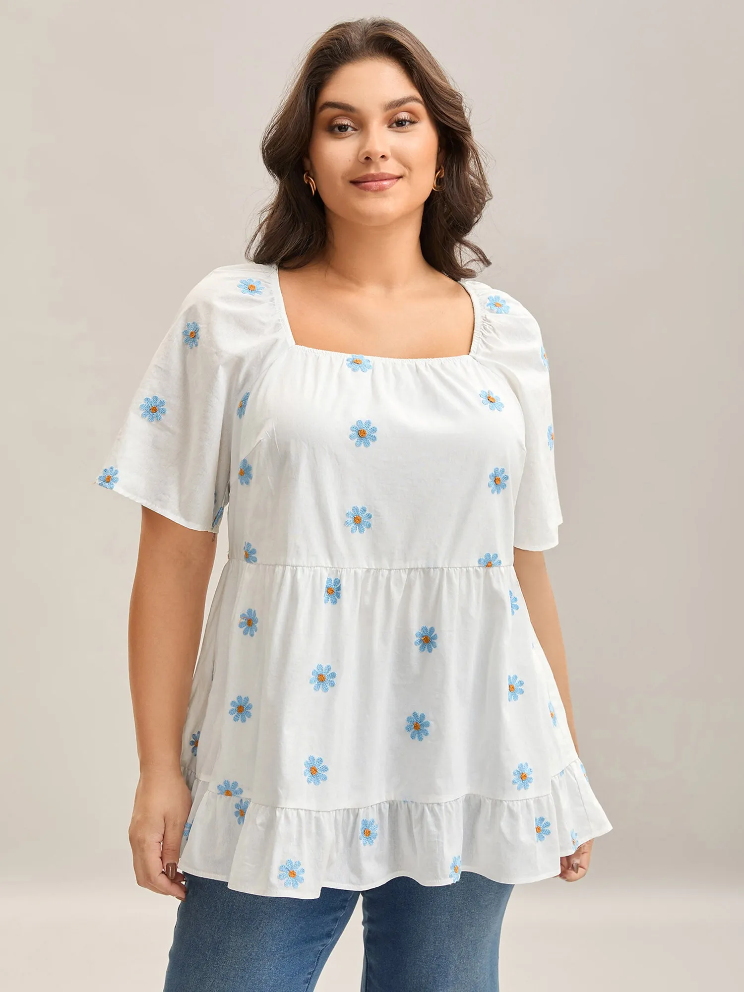 Floral Embroidered Ruffled Hem Doll Shirt sold by Bloomchic